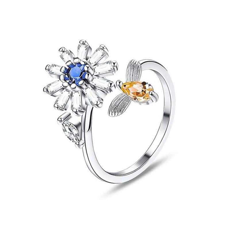 Angstring <Br>Roterende Blomst